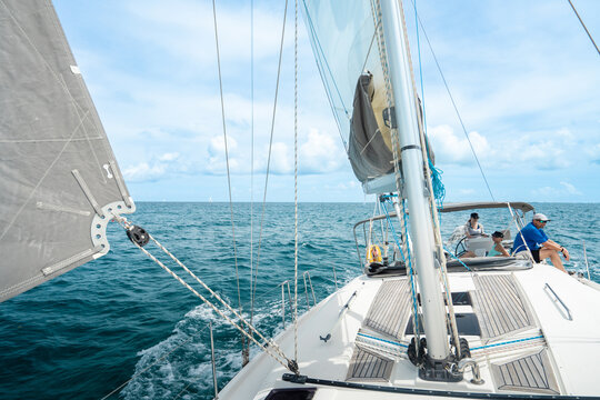 Friends Sailing on Caribbean Sailboat Vacation