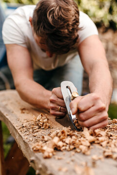 Craftsman restoring wood furniture