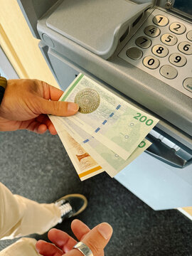 withdrawing money from an ATM in Copenhagen