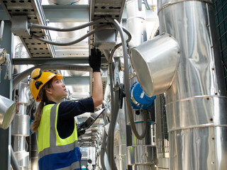 Female woman lady girl businesswoman person people human yellow hardhat helmet safety check up list...