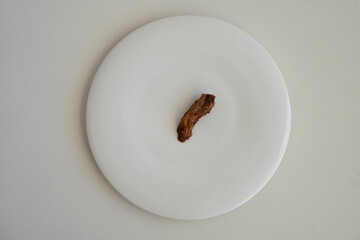Duck Tongue on a white plate
