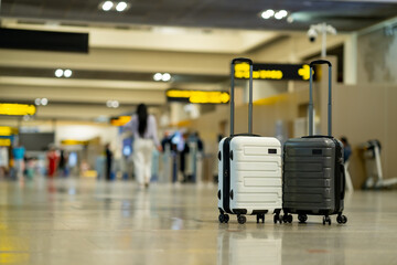 Travel, Two suitcases in an empty airport hall, traveler cases in the departure airport terminal waiting for the area, vacation concept, blank space for text message or design