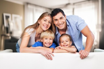 Happy attractive family at cozy home