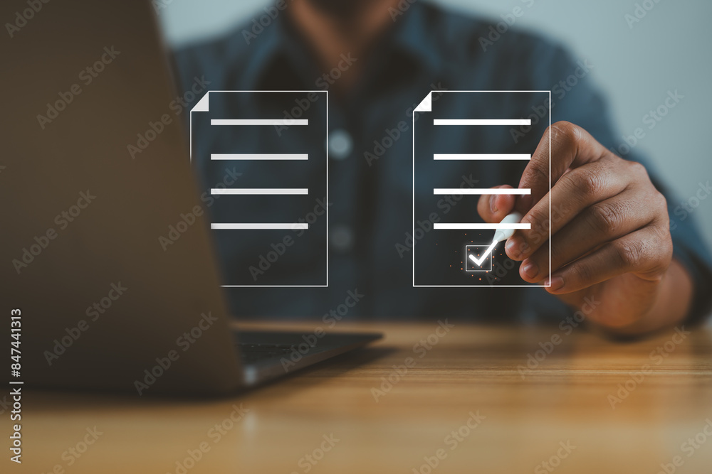 Aufkleber businessman using electronic pen to tick correct sign mark in online document checklist for quality 