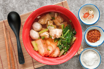 Wonton Noodles with Red Barbecue pork with clear hot soup.