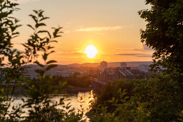  Ottawa River and Gatineau city of Quebec in Canada during sunset