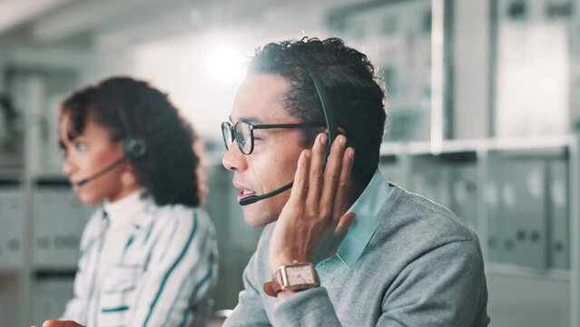 Telemarketing, customer service and man consultant in office with crm communication for online. Contact us, headset and male technical support, call center or sales agent working on hotline.