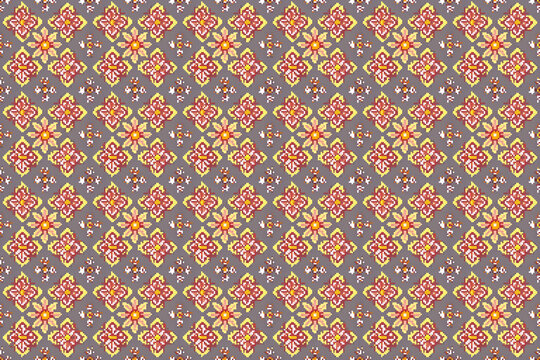 Thai fabric seamless patterns using pixel art patterns that combine Thai flowers such as lamduan flowers 