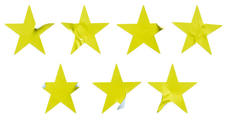 A set of yellow star shape paper sticker label isolated on white background.