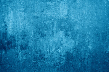 old blue concrete grungy plaster wall. Abstract blue grungy wall
