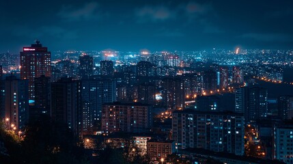 Fototapeta premium Stunning cityscape night view with illuminated skyscrapers and glowing streets, capturing the urban essence and bustling life of a modern metropolis.