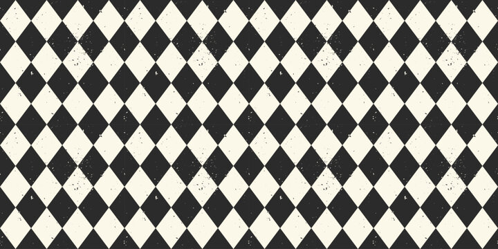 Distressed Diamond Check Pattern seamless background. Black and white Harlequin pattern with dirty texture. Pattern swatch is included.