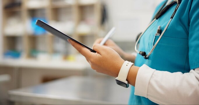Woman, vet and hands writing with tablet for research on animal medicine, study or browsing at clinic. Closeup of female person or veterinarian taking notes on technology for medical or pet treatment