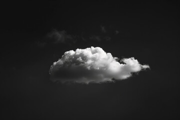 A cloud in the sky with a dark background