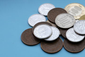 Japan money, Coins on blue background.