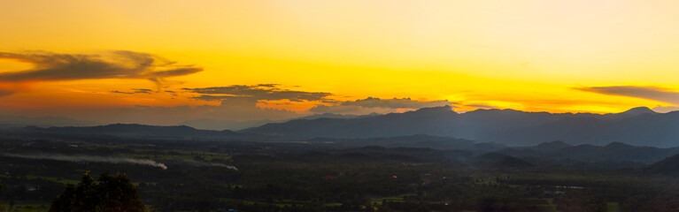Banner Scenic view dramatic beautiful sunset sky. Panorama Natural Sunset Sunrise on meadow silhouette shadow dark land. Vibrant dramatic sky in Countryside. Landscape Sky At Sunset with copy space