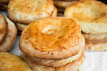 Close up of traditional Asian flatbread  on the counter  . Street bazaar