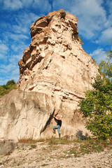 Naklejka premium The rock of the mountain is called a camel, against the background of a blue sky, near the village of Shiryaevo, Samara region of Russia