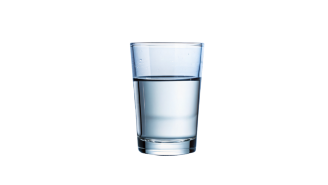 A clear glass filled with fresh water sits alone on a white background