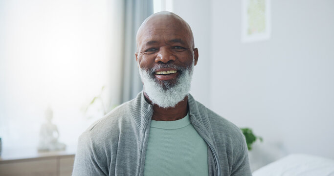 Senior, man and happy with portrait in home for relax, pensioner and confidence in retirement. Elderly, african person and face with smile, pride and good mood for wellness and positive attitude