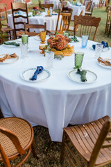 Autumn table setting with vintage drink-wear and plates