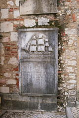 Detail of gothic carvings of a ship on a stone block
