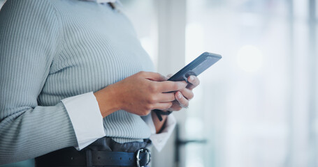 Hands, business person and typing with phone for communication, research or browsing at office. Corporate secretary, employee and mobile smartphone for online chat, texting or app at workplace