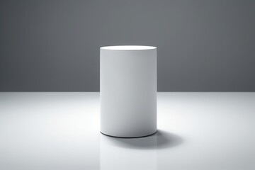 Empty white circle podium mockup with shadow effect, empty round pedestal for display, white ellipse cylinder podium for product presentation isolated on white background.