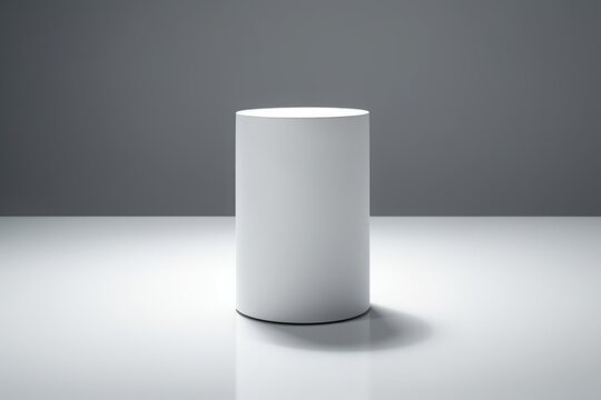 Empty white circle podium mockup with shadow effect, empty round pedestal for display, white ellipse cylinder podium for product presentation isolated on white background.