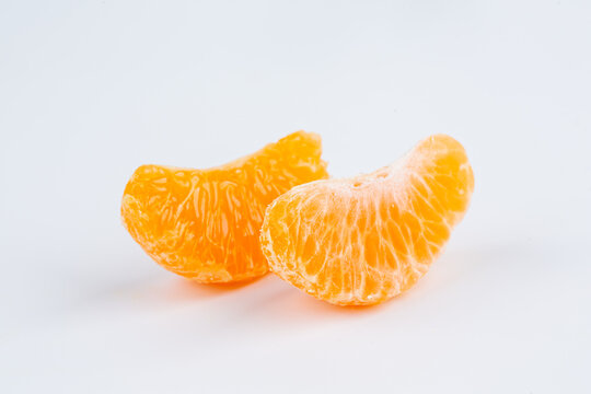 Orange with yellow fruit on white background