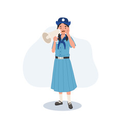 Cute Young Thai girl scout in uniform using megaphone. embodying leadership and communication skills.