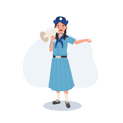 Cute Young Thai girl scout in uniform using megaphone. embodying leadership and communication skills.
