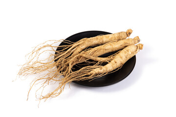 Chinese medicinal herb ginseng roots isolated on white background.