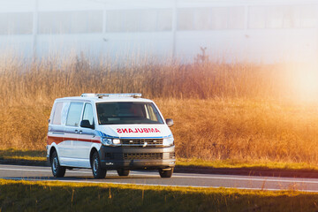 Paramedics provide urgent care in speeding ambulance