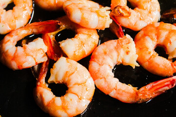 Prawns being cooked in hot oil