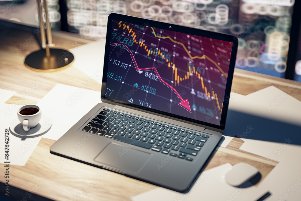 Poster close up of office workplace with falling forex chart on laptop monitor and other items. financial a