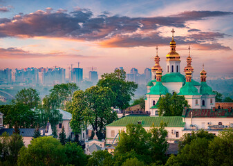 Amazing summer sunrise of Kiev Pechersk Lavra Orthodox Monastery. Impressive morning view of Kiev,...
