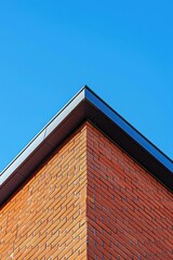 red brick building on blue sky background