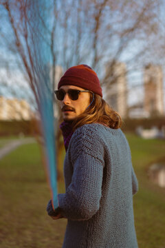 Young man on slackline in the park.