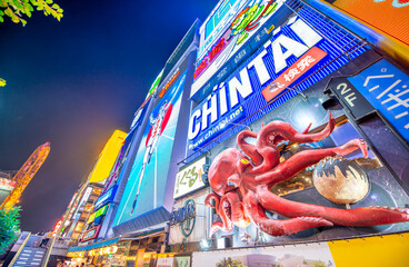 Osaka, Japan - May 28, 2016: Colourful illuminated buildings in Dotonbori at night