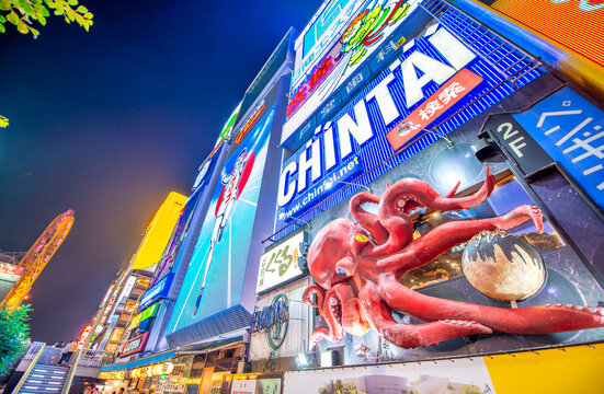 Osaka, Japan - May 28, 2016: Colourful illuminated buildings in Dotonbori at night