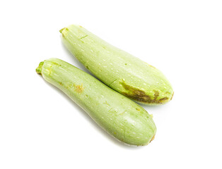 Green zucchini on a white background