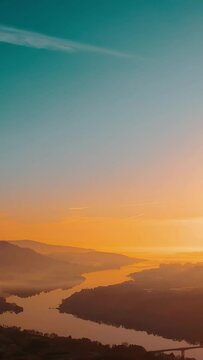 Sunset over the mountains - vertical background drone video