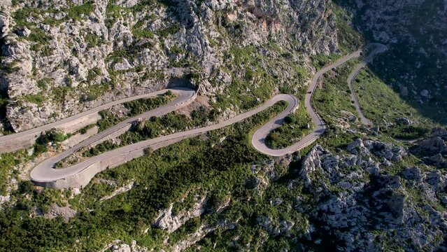 4K Aerial Drone video of mesmerizing serpentine roads in the mountains of Coll dels Reis, Nus de Sa Corbata, Mallorca