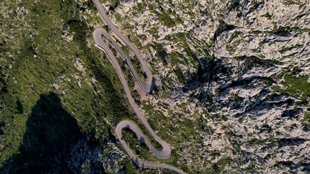 4K Aerial Drone video of mesmerizing serpentine roads in the mountains of Coll dels Reis, Nus de Sa Corbata, Mallorca