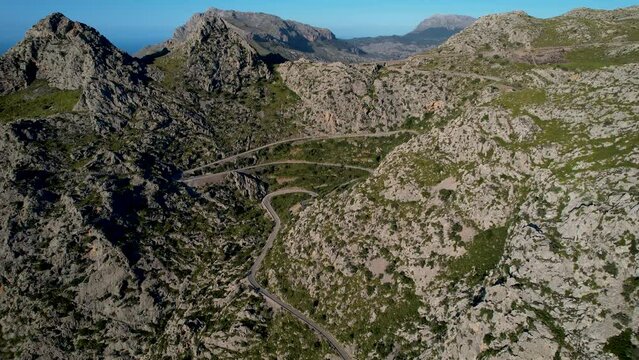 4K Aerial Drone video of mesmerizing serpentine roads in the mountains of Coll dels Reis, Nus de Sa Corbata, Mallorca