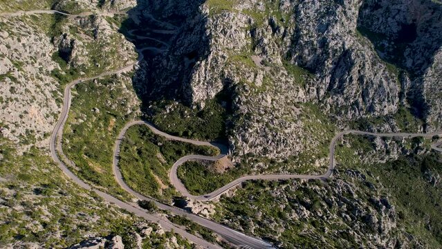 4K Aerial Drone video of mesmerizing serpentine roads in the mountains of Coll dels Reis, Nus de Sa Corbata, Mallorca