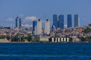 Fototapeta premium Blue seascape overlooking the coast. View of the Bosphorus in Istanbul city on sunny summer day, in a public place.
