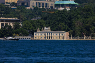 Fototapeta premium Blue seascape overlooking the coast. View of the Bosphorus in Istanbul city on sunny summer day, in a public place.