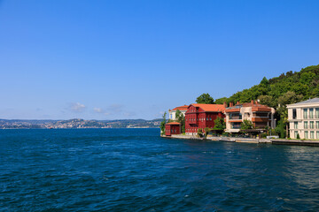 Blue seascape overlooking the coast. View of the Bosphorus in Istanbul city on sunny summer day, in a public place.